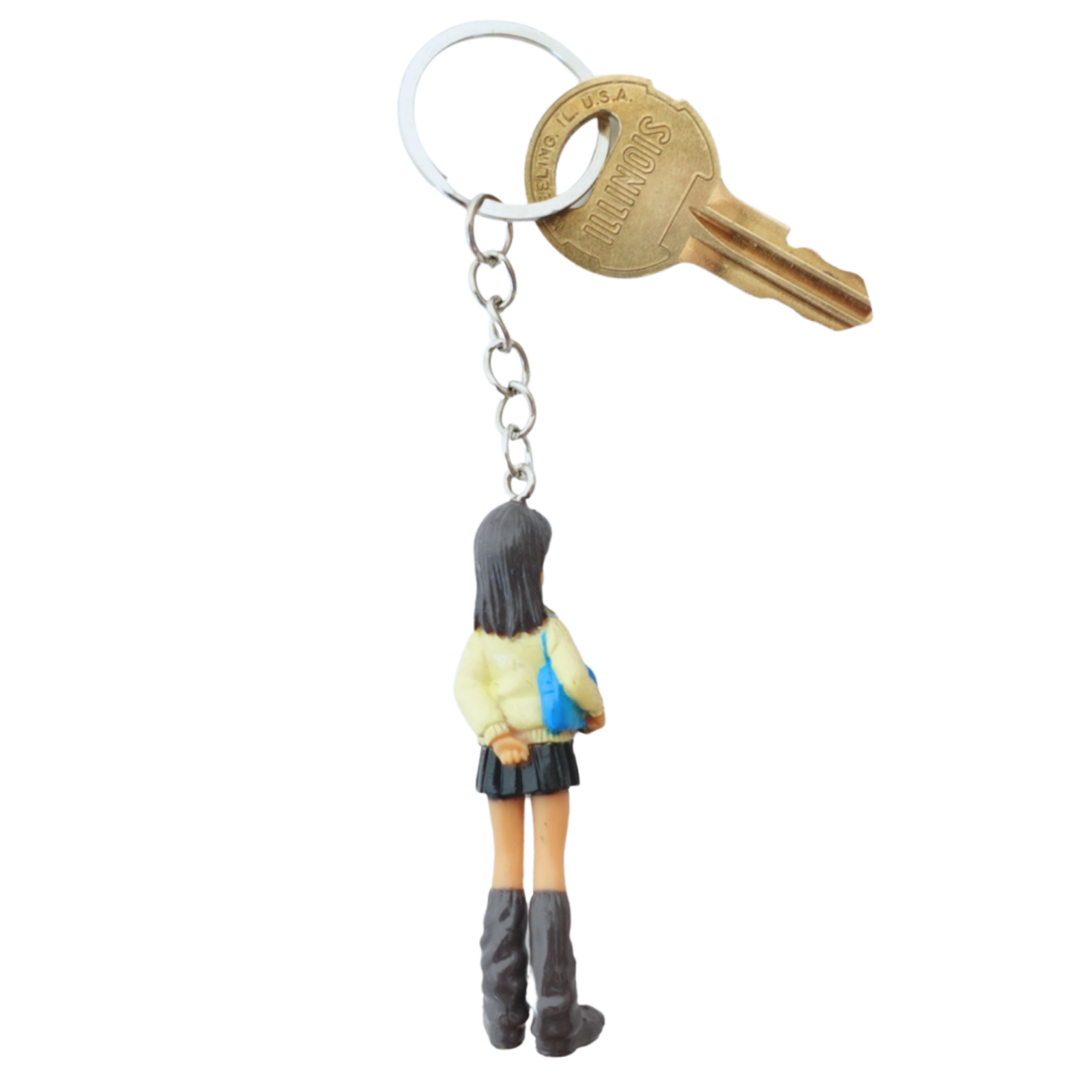2000s Dolls Charm Winter Girl keychain back view in yellow jacket
