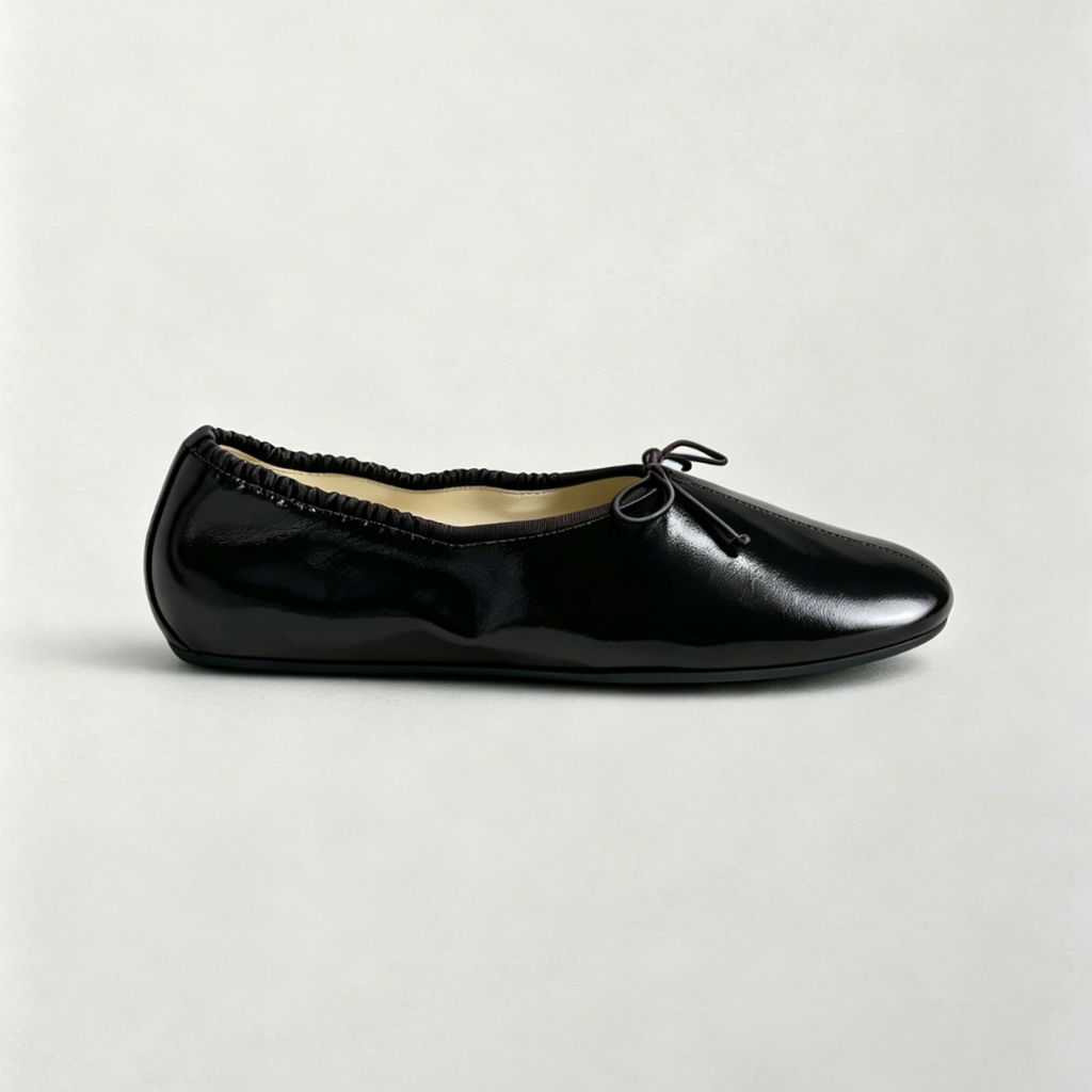 Black loafer shoe on a white background