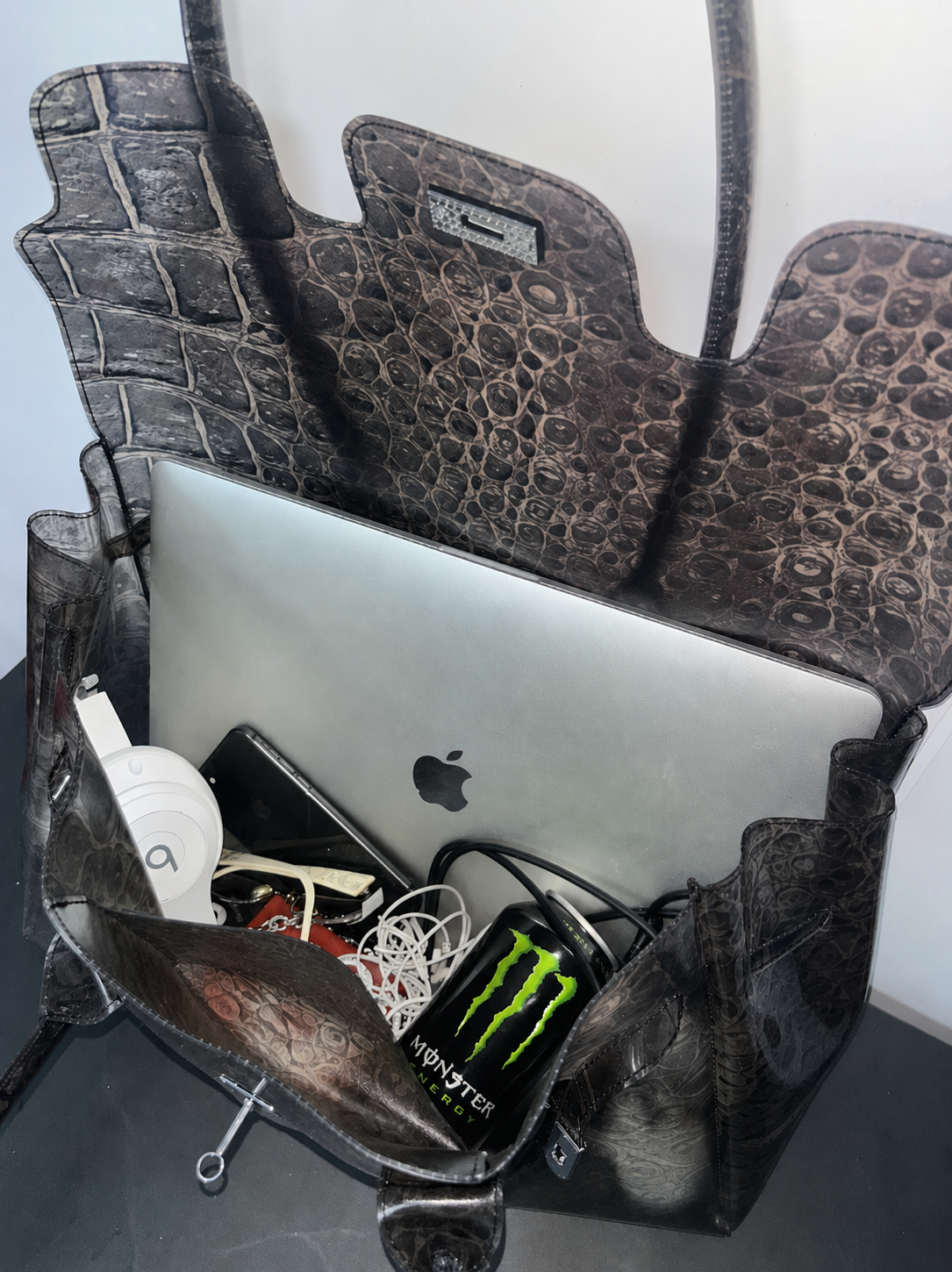 Jelly Firkin 40 Bag Croc open with laptop and accessories on gray surface
