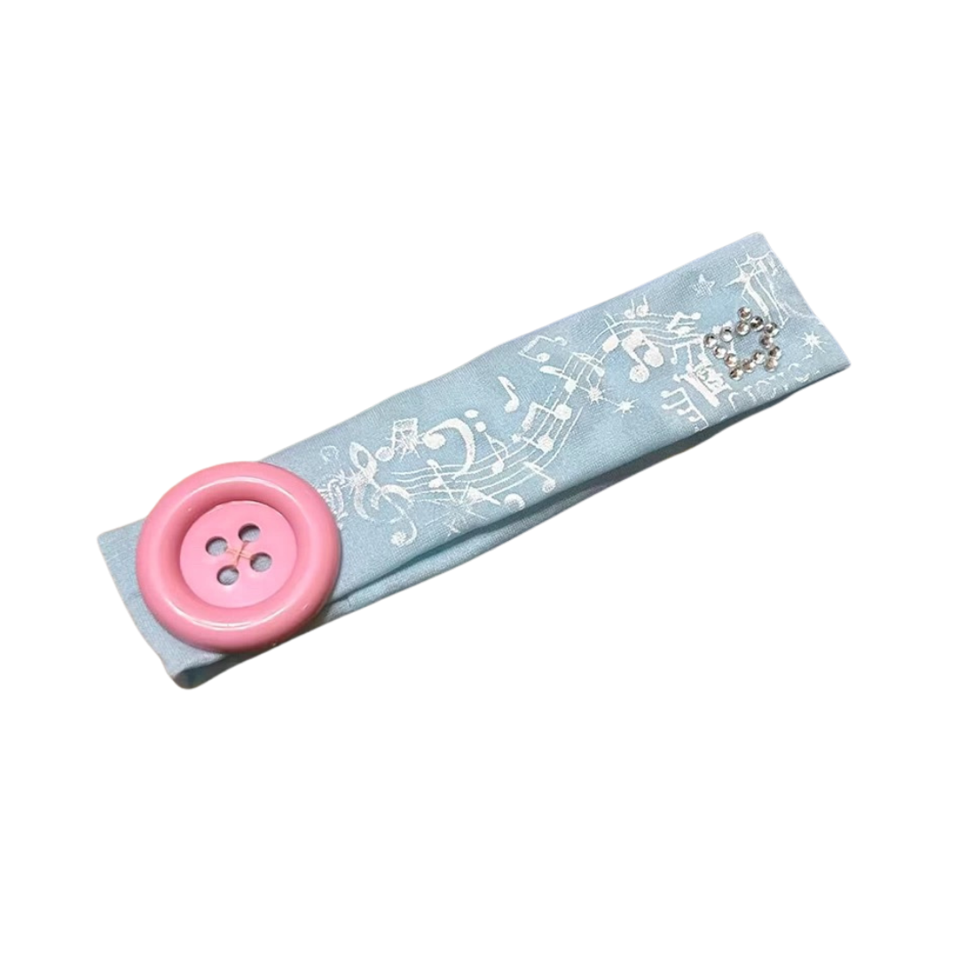 Sweet Melody Button Headband Icy Blue front view on white background