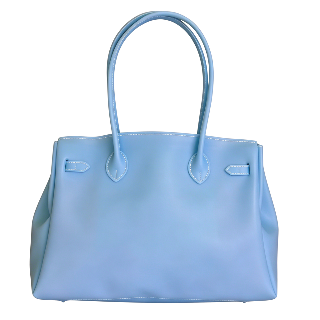 Light blue handbag with handles on a white background