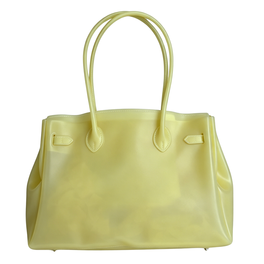 Yellow handbag with handles on a white background