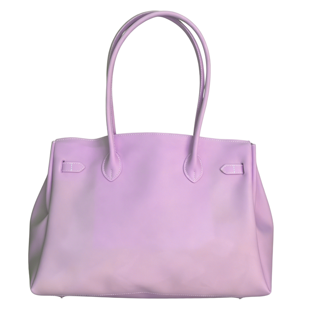 Pink handbag with on a white background