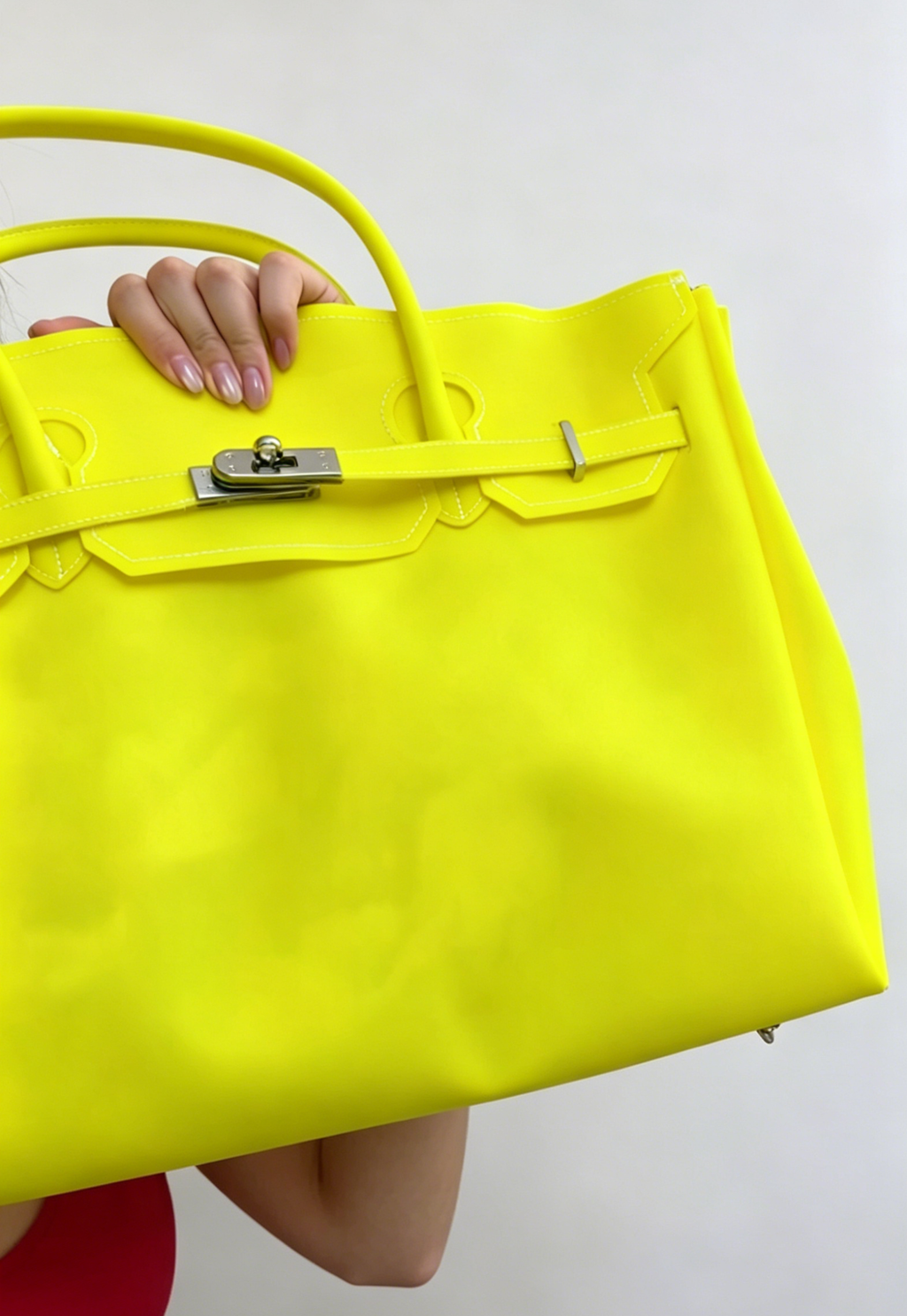 Jelly Firkin 40 Bag Classic Lemon held by woman against white background