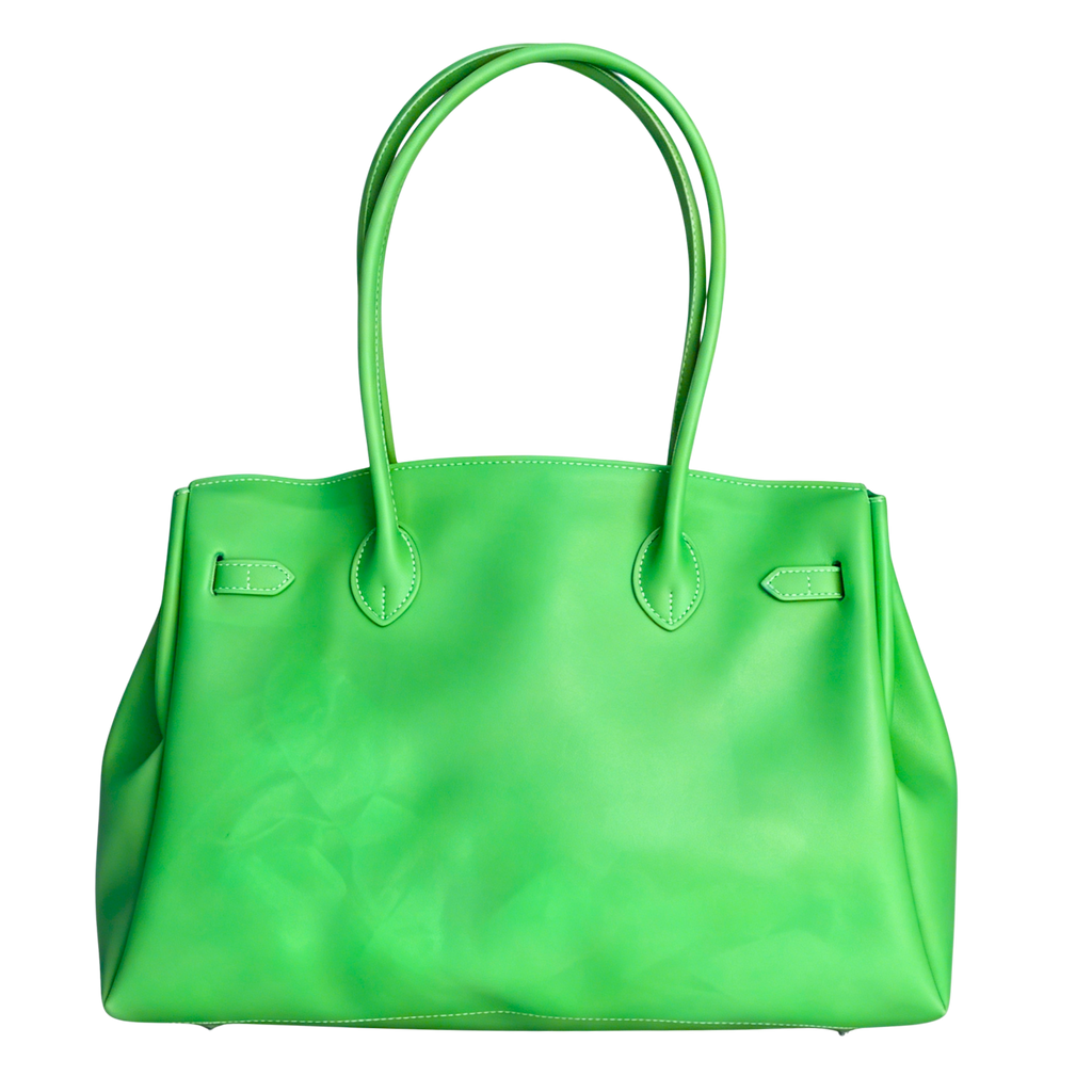 Green handbag on a white background