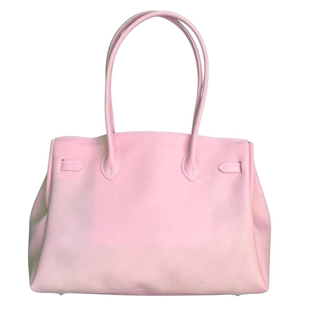 Pink handbag on a white background
